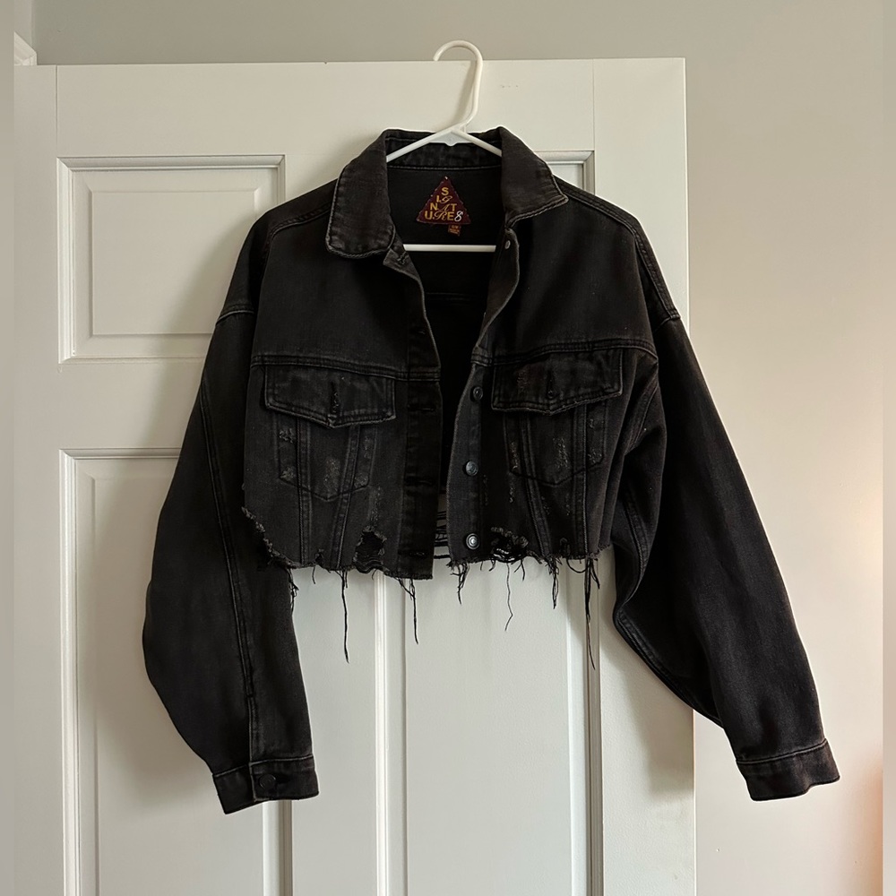 Distressed denim jacket